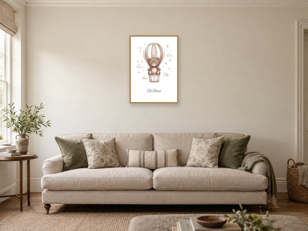 Be Brave — Teddy Sky Adventures Nursery Print at A2, in a natural wood frame, in a sitting room