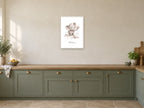 Be Curious — Elephant Little Wonders Nursery Print at A2, in a white frame, in a kitchen