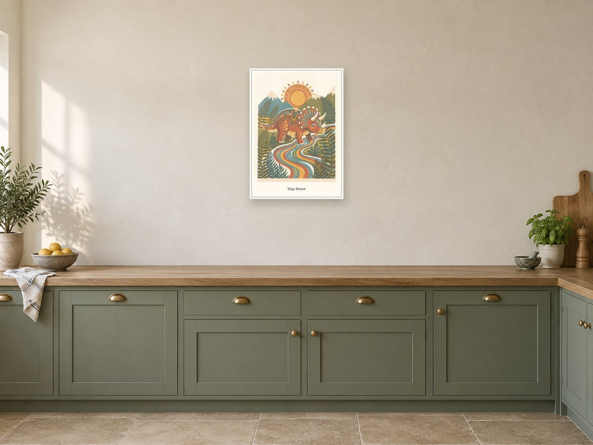 Stay Brave — Dinosaur Discovery Children’s Art Print at A2, in a white frame, in a kitchen