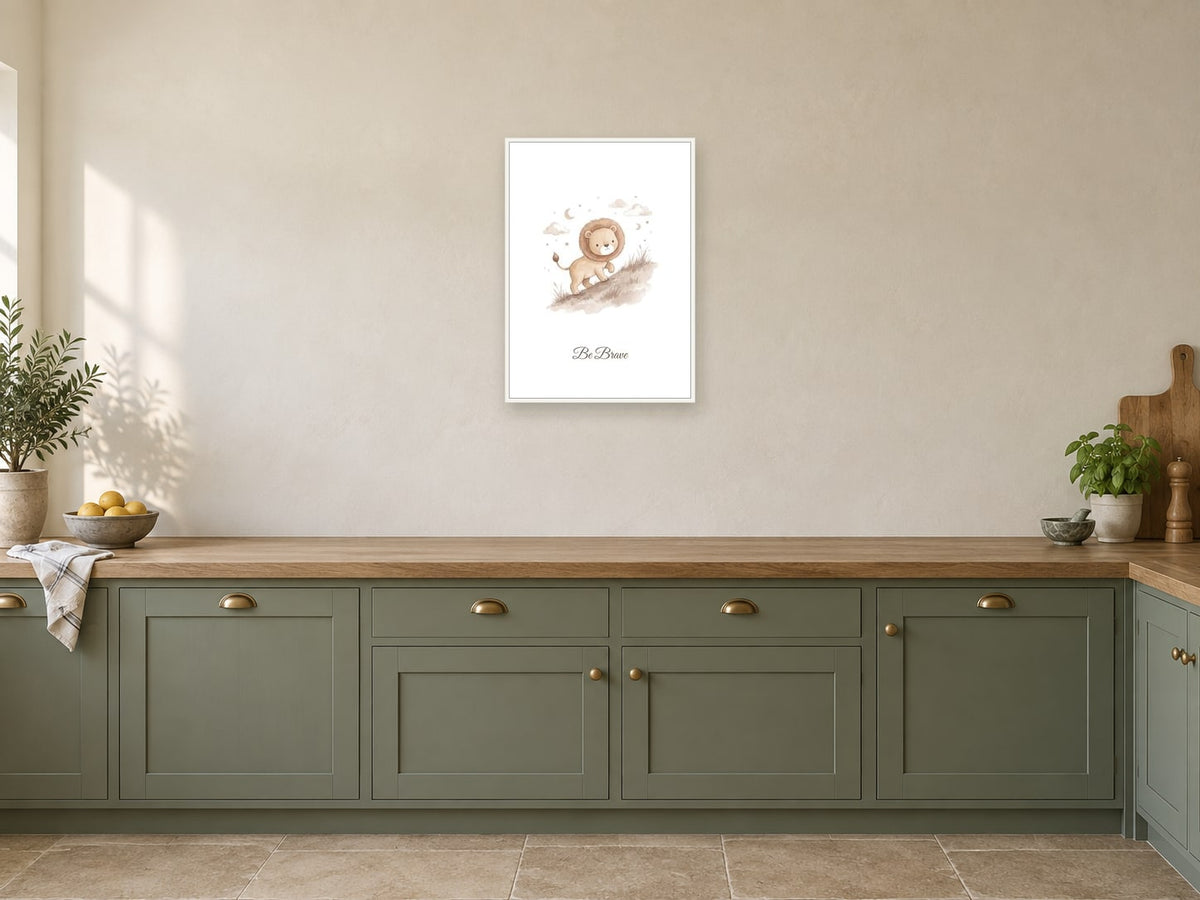 Be Brave — Little Lion Hearts Nursery Print at A2, in a white frame, in a kitchen