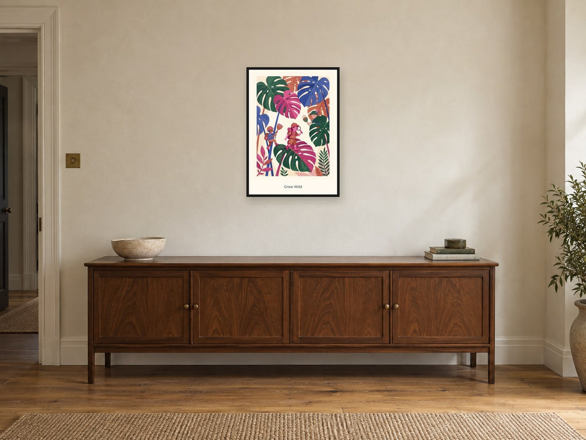 Grow Wild — Botanical Explorers Children’s Art Print at A2, in a black frame, above a sideboard