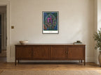 Stay Curious — Botanical Explorers Children’s Art Print at A2, in a black frame, above a sideboard