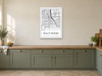 Baltimore Downtown Street Map Poster at A1, in a white frame, in a kitchen