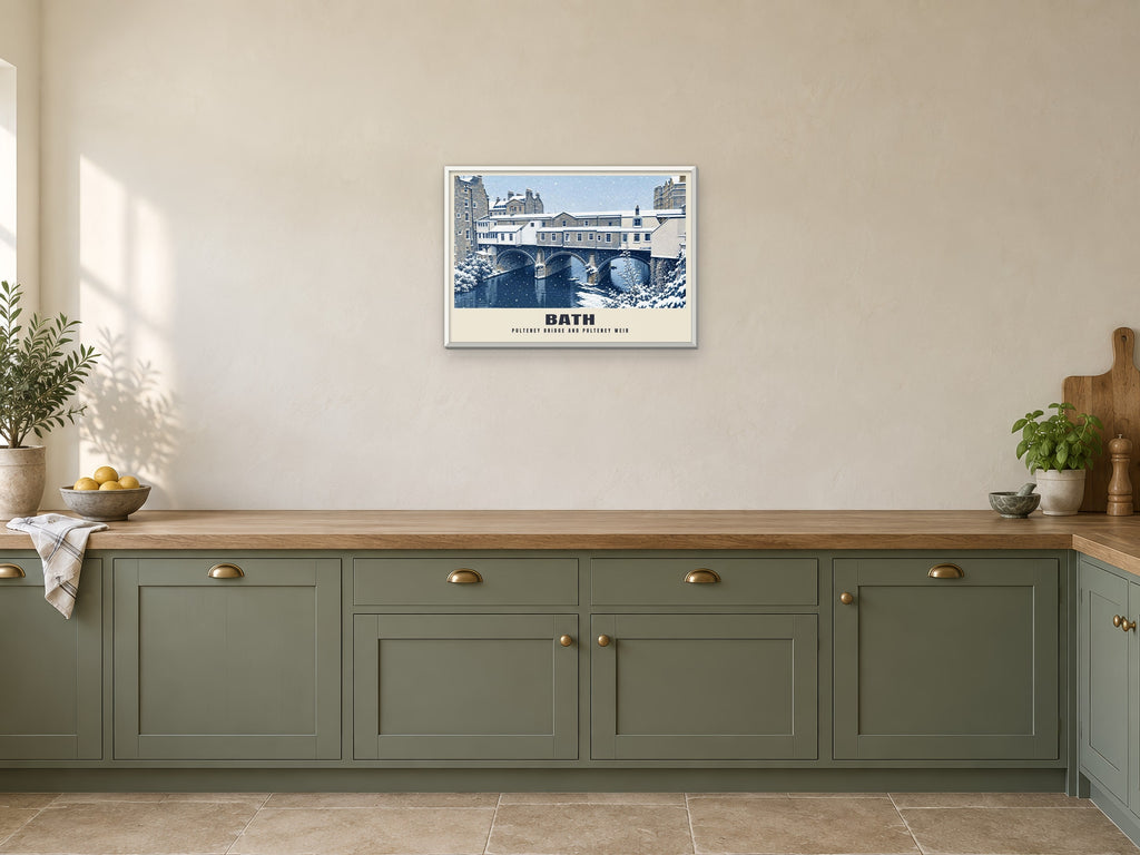 Pulteney Bridge and Pulteney Weir, Bath Winter Poster at A2, in a white frame, in a kitchen