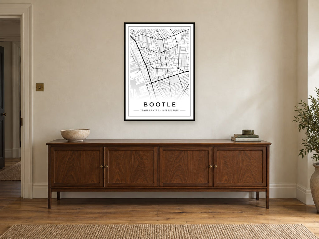 Bootle Town Centre Street Map Poster at A1, in a black frame, above a sideboard