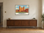 Caerphilly Castle Poster at A1, in a black frame, above a sideboard