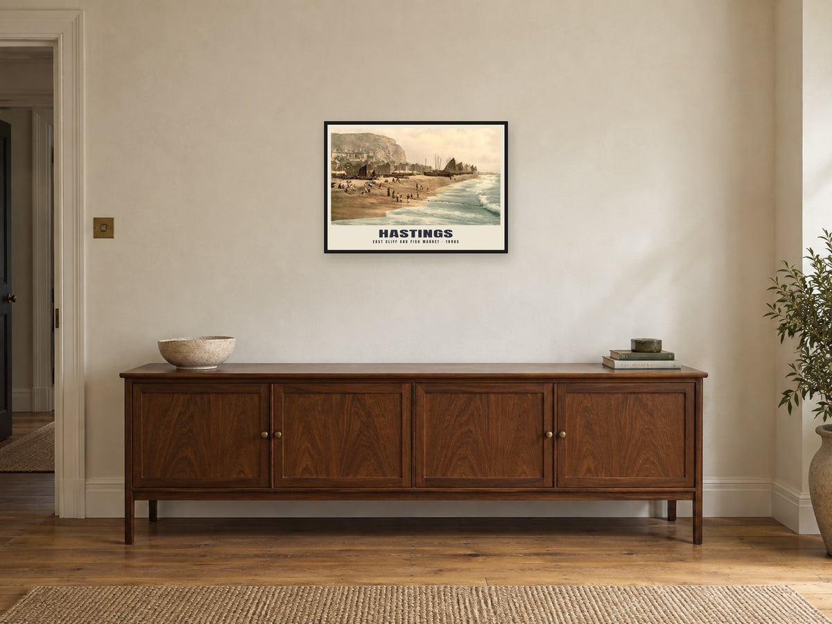 East Cliff and Fish Market, Hastings, 1890s Heritage Print at A2, in a black frame, above a sideboard