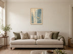 Ripples Before Breakfast — A2 artwork shown in a room with a natural wood frame; select a framed finish to include a frame