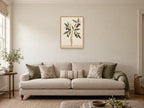 Magnolia in a Tall Vase — A2 artwork shown in a room with a natural wood frame; select a framed finish to include a frame