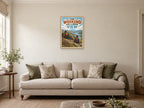 The Weekend Has a Wider View — A2 artwork shown in a room with a natural wood frame; select a framed finish to include a frame