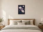 Moth among Moonflowers — A2 artwork shown in a room with a natural wood frame; select a framed finish to include a frame