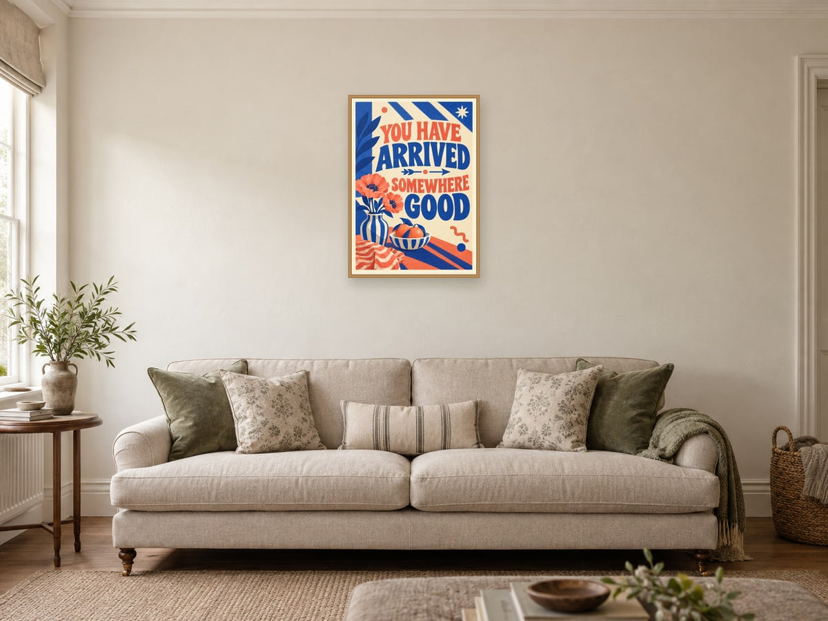 You Have Arrived Somewhere Good — A2 artwork shown in a room with a natural wood frame; select a framed finish to include a frame