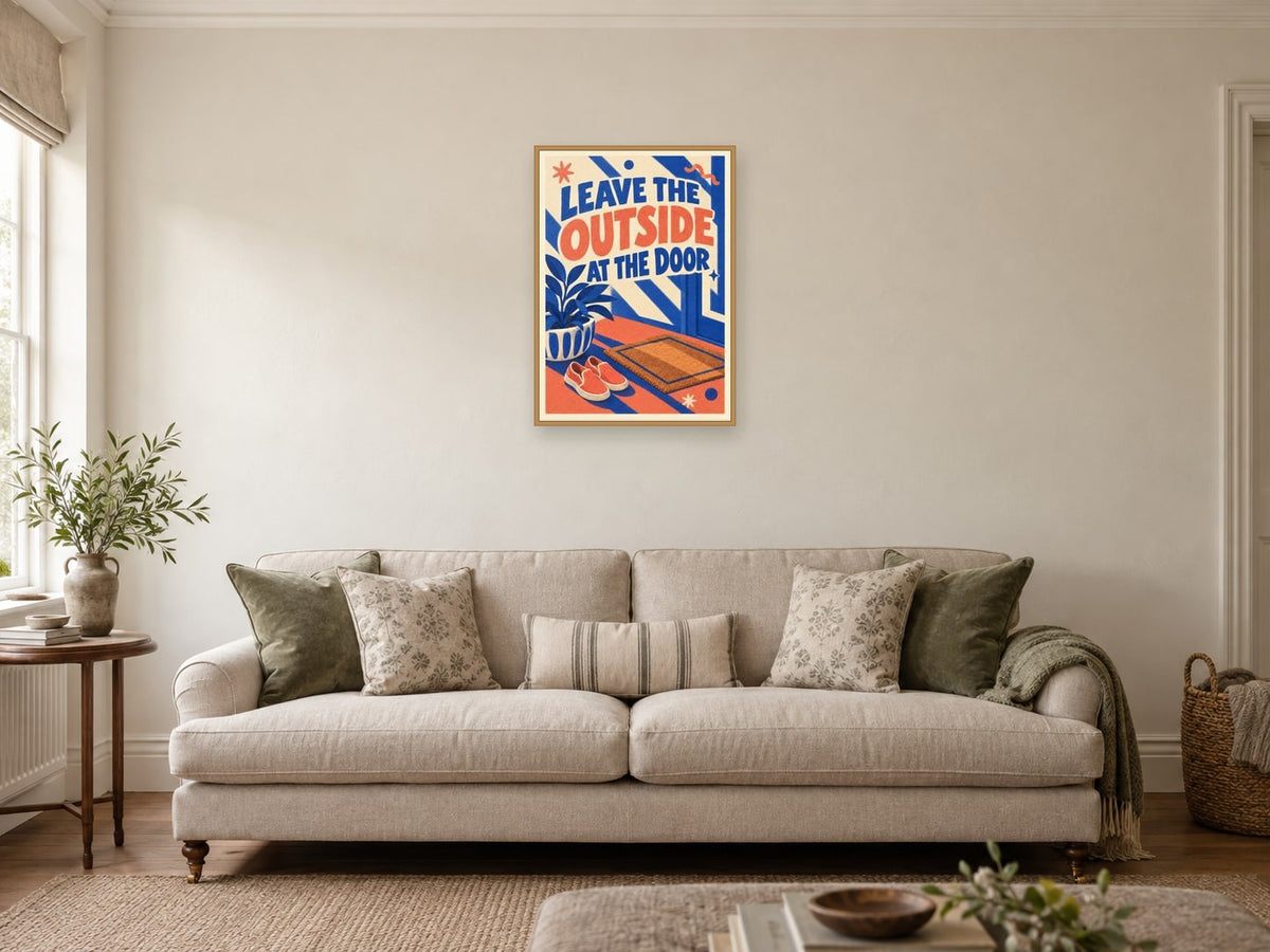 Leave the Outside at the Door — A2 artwork shown in a room with a natural wood frame; select a framed finish to include a frame