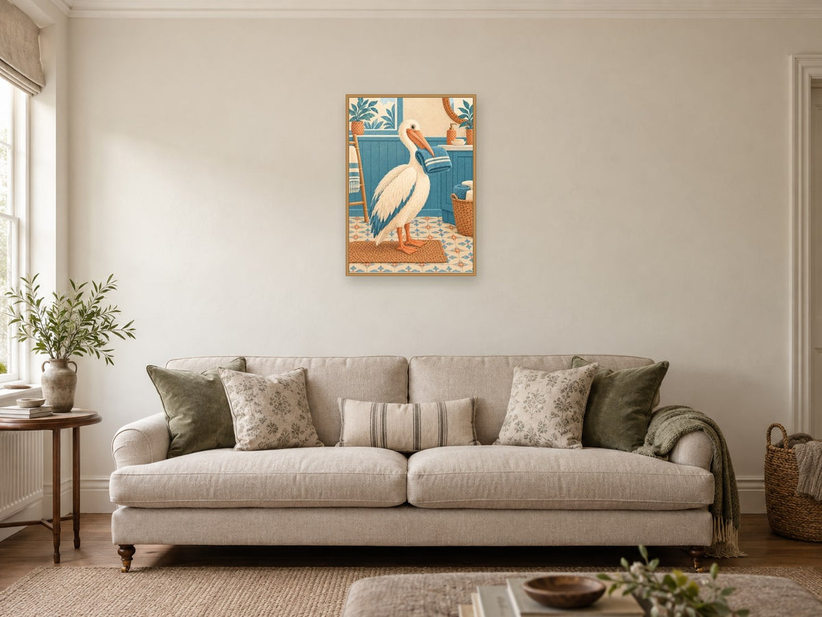 pelican balancing a folded towel — A2 artwork shown in a room with a natural wood frame; select a framed finish to include a frame