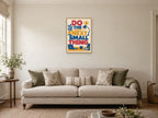 Do The Next Small Thing — A2 artwork shown in a room with a natural wood frame; select a framed finish to include a frame