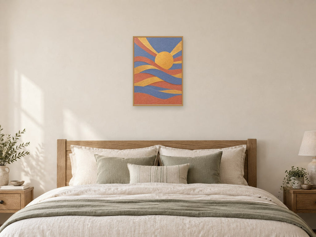 Woven blush and gold bands around an offset sun — A2 artwork shown in a room with a natural wood frame; select a framed finish to include a frame