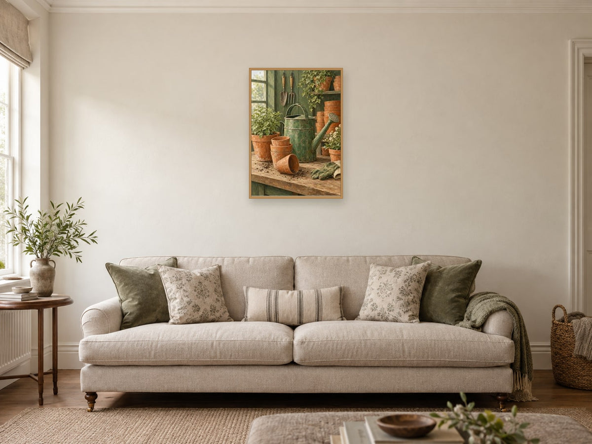 Terracotta pots and a weathered green watering can — A2 artwork shown in a room with a natural wood frame; select a framed finish to include a frame