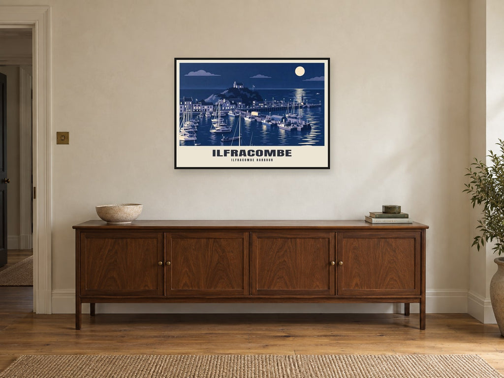 Ilfracombe harbour Poster at A1, in a black frame, above a sideboard