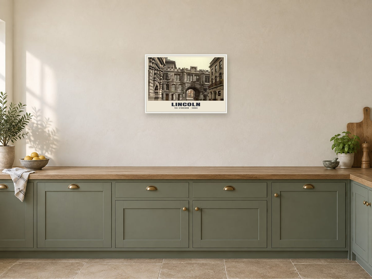 The Stonebow, Lincoln, 1890s Heritage Print at A2, in a white frame, in a kitchen