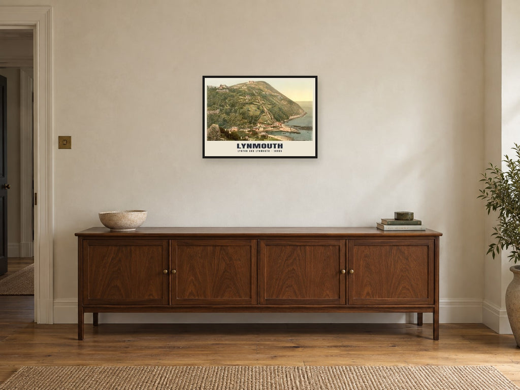 Lynton and Lynmouth Poster at A2, in a black frame, above a sideboard
