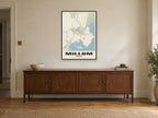 Millom Street Map Poster at A1, in a black frame, above a sideboard
