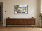 The River Esk, Musselburgh Poster at A1, in a black frame, above a sideboard