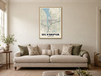 Olympia Street Map Poster at A1, in a natural wood frame, in a sitting room