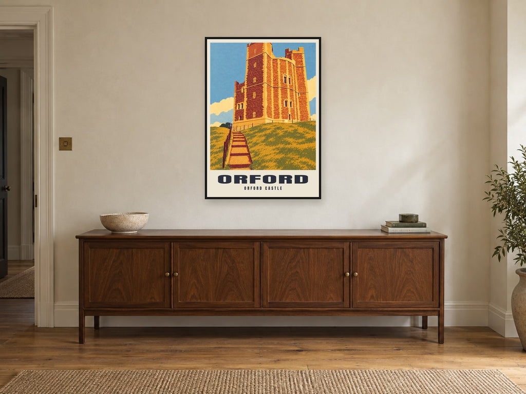 Orford Castle Poster at A1, in a black frame, above a sideboard