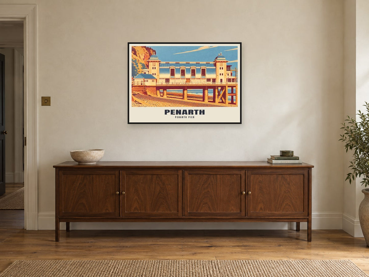 Penarth Pier Poster at A1, in a black frame, above a sideboard