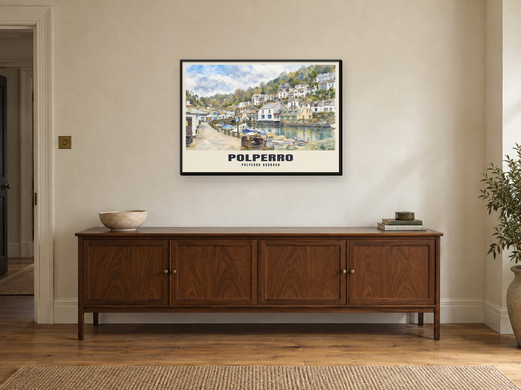 Polperro Harbour Poster at A1, in a black frame, above a sideboard