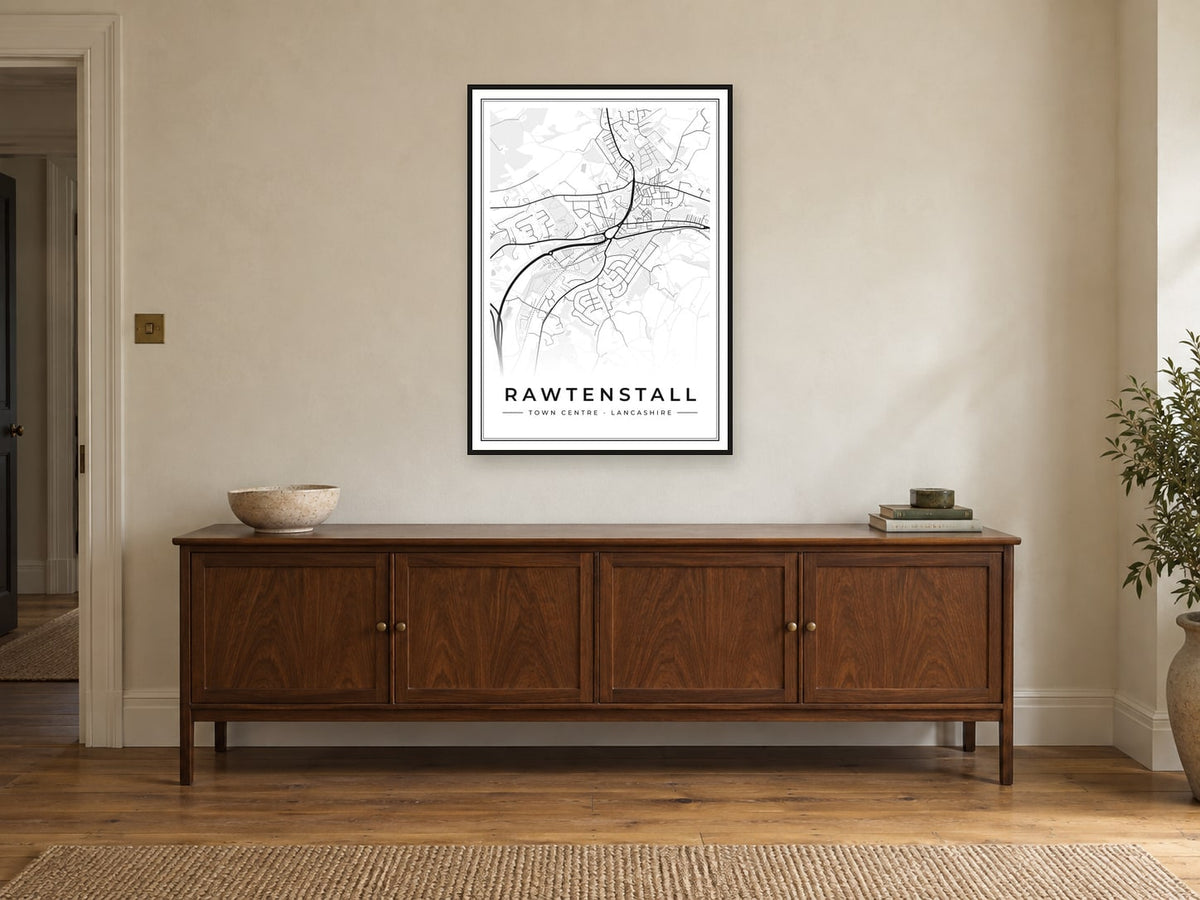 Rawtenstall Town Centre Street Map Poster at A1, in a black frame, above a sideboard