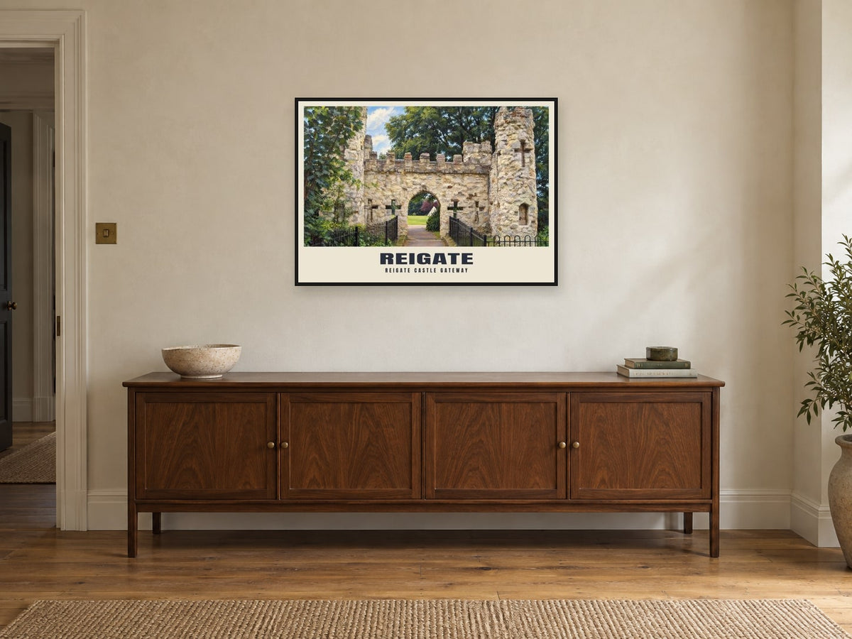 Reigate Castle Gateway Poster at A1, in a black frame, above a sideboard