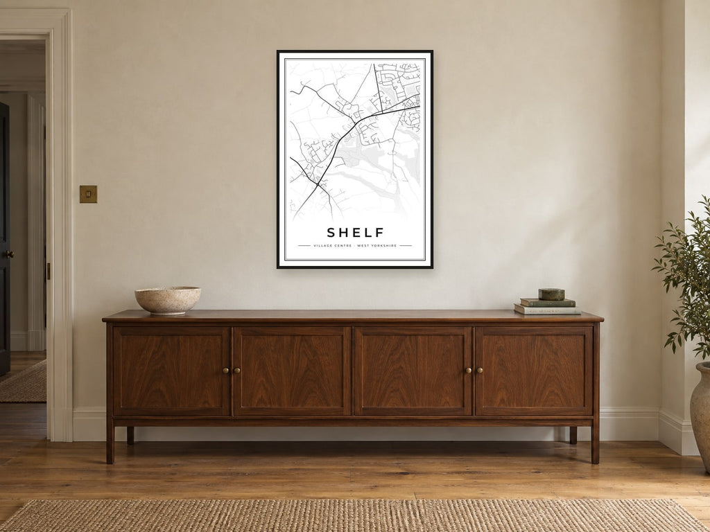 Shelf Village Centre Street Map Poster at A1, in a black frame, above a sideboard