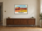 Southsea Castle Poster at A1, in a black frame, above a sideboard