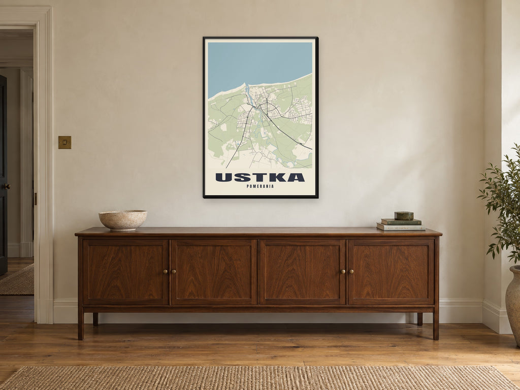 Ustka Street Map Poster at A1, in a black frame, above a sideboard